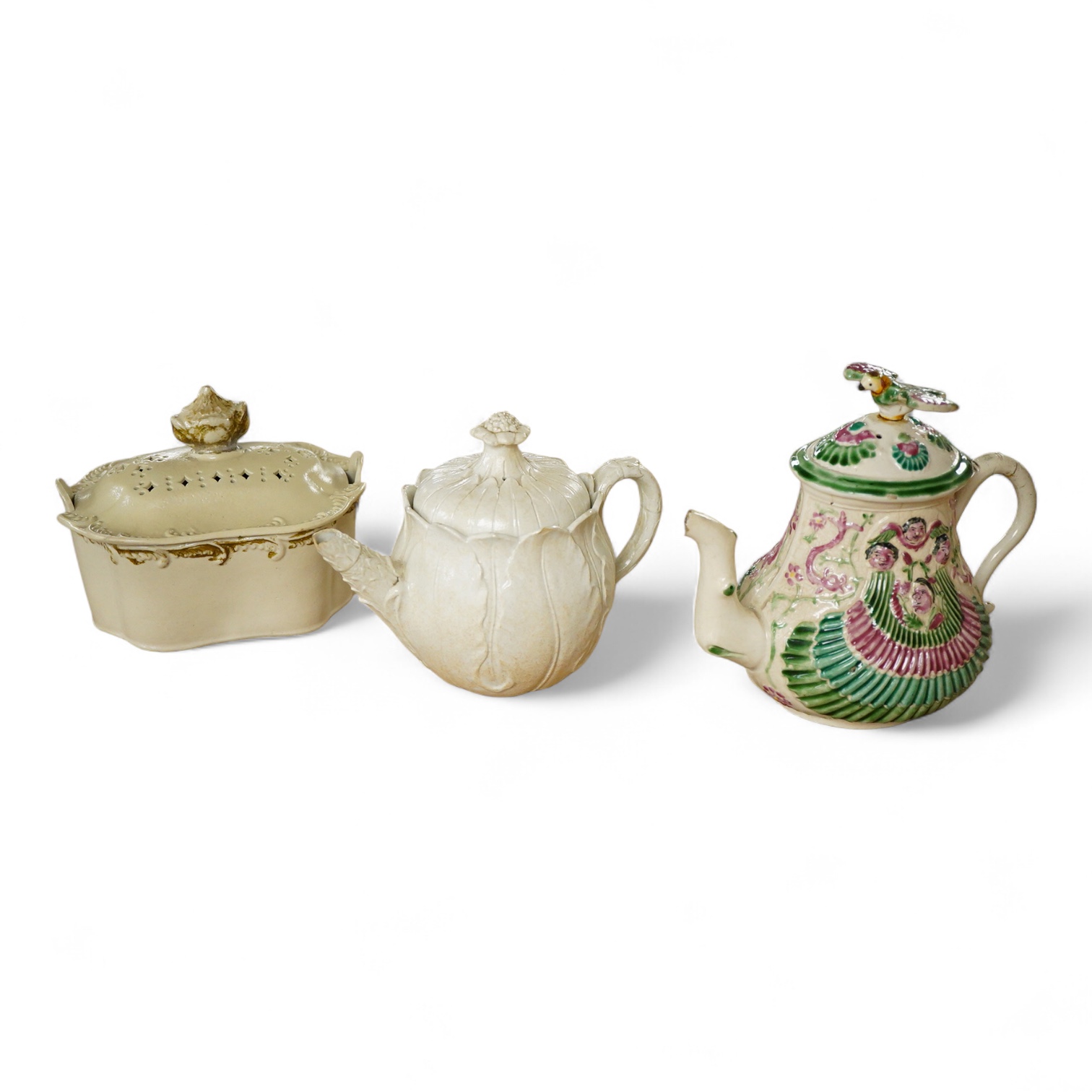 A rare Staffordshire saltglaze stoneware teapot, mid 18th century, an early 19th Wedgwood stoneware teapot and a stoneware butter tub and cover - 13cm wide (3)